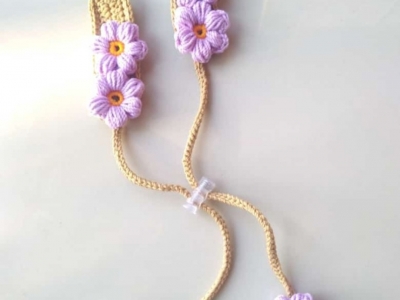 Strapmasker rajut bunga